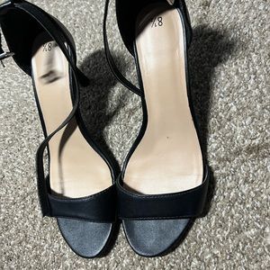 Black thin strapped heel size 8.5